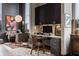 Home office area featuring a built-in desk, natural light, and stylish decor at 3959 Central Ave, Indianapolis, IN 46205
