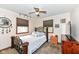 Bedroom featuring an iron bed, ceiling fan and carpet flooring at 4080 Wander Way, Greenwood, IN 46142
