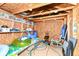 Interior of pool shed with walls made of wood and filled with pool supplies at 4080 Wander Way, Greenwood, IN 46142