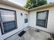 Private outdoor patio with vinyl siding, offering a relaxing space with natural light at 4408 Clovelly Ct, Indianapolis, IN 46254
