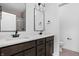 Bathroom with double vanity, modern fixtures, and a separate toilet room for added privacy at 443 Flora Pl, Carmel, IN 46290