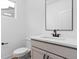 Stylish half-bathroom featuring modern fixtures and a sleek design with a floating vanity at 443 Flora Pl, Carmel, IN 46290