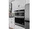 Modern kitchen with stainless steel oven, microwave and refrigerator at 443 Flora Pl, Carmel, IN 46290