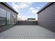 Spacious rooftop deck between two buildings offers an ideal place for outdoor entertaining and relaxation at 443 Flora Pl, Carmel, IN 46290