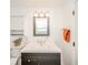 Bathroom with modern fixtures, a vanity with storage, and a well-lit mirror, offering a clean and functional space at 4491 W 600 N, Anderson, IN 46011