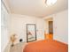 Bright bedroom featuring natural light, a full-length mirror, and neutral decor, creating a relaxing atmosphere at 4491 W 600 N, Anderson, IN 46011