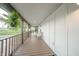 Spacious covered porch with an open design and views of the surrounding green landscape at 4491 W 600 N, Anderson, IN 46011