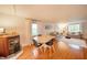 Bright living room featuring hardwood floors, comfortable seating, and ample natural light at 4491 W 600 N, Anderson, IN 46011