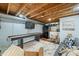 Finished basement with a kitchenette, open ceiling, recreation space, and vinyl flooring at 460 W Hinshaw Dr, Nineveh, IN 46164