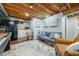 Finished basement with a kitchenette, open ceiling, and recreation space at 460 W Hinshaw Dr, Nineveh, IN 46164