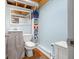 Basement powder room with vinyl flooring and plenty of storage at 460 W Hinshaw Dr, Nineveh, IN 46164