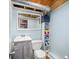Basement powder room with vinyl flooring and plenty of storage at 460 W Hinshaw Dr, Nineveh, IN 46164