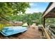 Wooden boat dock with boats, lake access, lawn furniture and storage at 460 W Hinshaw Dr, Nineveh, IN 46164