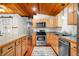 The kitchen features stainless steel appliances, light wood cabinets, granite countertops, and hardwood floors at 460 W Hinshaw Dr, Nineveh, IN 46164