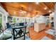 Inviting open-concept layout with hardwood floors, a wood ceiling, and plenty of space for entertaining and relaxing at 460 W Hinshaw Dr, Nineveh, IN 46164