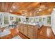 Open living space features wood ceilings, hardwood floors, a dining area, and comfortable seating at 460 W Hinshaw Dr, Nineveh, IN 46164