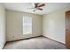 Modest bedroom with neutral walls, carpet and a window with blinds at 4749 Rocky Knob Ln, Indianapolis, IN 46254