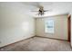 Bedroom featuring carpet, ceiling fan and natural light from window at 4749 Rocky Knob Ln, Indianapolis, IN 46254