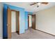 Modest bedroom showing neutral walls, carpet and doors to closets and rooms at 4749 Rocky Knob Ln, Indianapolis, IN 46254