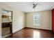 Dining space with hardwood floors and adjacent view into kitchen area at 4749 Rocky Knob Ln, Indianapolis, IN 46254