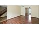 Spacious living room with hardwood floors and seamless flow to other rooms at 4749 Rocky Knob Ln, Indianapolis, IN 46254