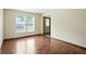 Bright living room featuring hardwood floors and lots of natural light at 4749 Rocky Knob Ln, Indianapolis, IN 46254