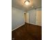 Comfortable bedroom with wood floors and closet at 4908 Elmhurst Dr, Indianapolis, IN 46226