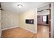 This bedroom features wood laminate flooring and a decorative wall at 517 N Leland St, Fortville, IN 46040