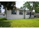 Attractive single-story home with a spacious lawn and inviting front entrance at 517 N Leland St, Fortville, IN 46040