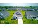 Aerial view of a two-story home with a blue porch and well-maintained landscaping at 5199 Green Valley Ln, Noblesville, IN 46062