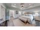 Bright bedroom with light-colored walls, wood floors, a light ceiling and neutral decor at 5199 Green Valley Ln, Noblesville, IN 46062
