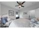 Relaxing bedroom featuring a ceiling fan, comfortable bed, and a peaceful atmosphere at 5199 Green Valley Ln, Noblesville, IN 46062