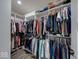 Walk-in closet with an abundance of shelving, hanging racks, and organized storage for clothing at 5199 Green Valley Ln, Noblesville, IN 46062
