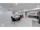 The dining area includes a table with seating for six and has view of a buffet and other furnishings at 5199 Green Valley Ln, Noblesville, IN 46062