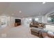 Basement living room boasts a neutral color scheme, plush carpeting, and ample seating at 5199 Green Valley Ln, Noblesville, IN 46062