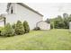 Spacious backyard featuring a storage shed, mature trees, and well-maintained lawn at 5234 Melbourne Rd, Indianapolis, IN 46228