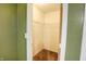 Walk-in closet with carpet, wire rack shelving and door at 5234 Melbourne Rd, Indianapolis, IN 46228