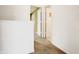 Hallway with neutral carpet leading to multiple rooms at 5234 Melbourne Rd, Indianapolis, IN 46228