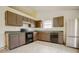 Functional kitchen with stainless steel fridge and adequate storage at 5234 Melbourne Rd, Indianapolis, IN 46228