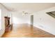 Spacious living room with a classic brick fireplace and abundant natural light at 5234 Melbourne Rd, Indianapolis, IN 46228