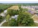 Aerial view of home showcasing landscaped yard, surrounded by mature trees and farmland at 5538 N 700 W, McCordsville, IN 46055