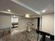 Basement workout area with pool table through doorway at 5538 N 700 W, McCordsville, IN 46055