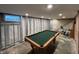 Unfinished basement features a pool table near stairs at 5538 N 700 W, McCordsville, IN 46055