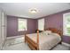 Bedroom features a four poster bed, neutral walls and carpet, and two windows at 5538 N 700 W, McCordsville, IN 46055