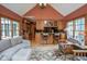 Open living area with vaulted ceiling, wet bar and comfortable seating near bright windows at 5538 N 700 W, McCordsville, IN 46055