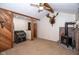 Cozy living room featuring wood accents, a fireplace, and rustic decor for a warm and inviting atmosphere at 5538 N 700 W, McCordsville, IN 46055