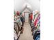 Well-organized walk-in closet with built-in shelving and ample storage space for clothes and accessories at 5538 N 700 W, McCordsville, IN 46055