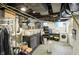 Clean basement featuring painted walls and ceilings, offering potential for versatile use at 5922 Broadway St, Indianapolis, IN 46220