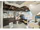 Unfinished basement with washer, dryer, storage shelves, and ample space at 5922 Broadway St, Indianapolis, IN 46220