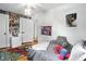 Bedroom with themed decor and large windows overlooking the yard at 5922 Broadway St, Indianapolis, IN 46220